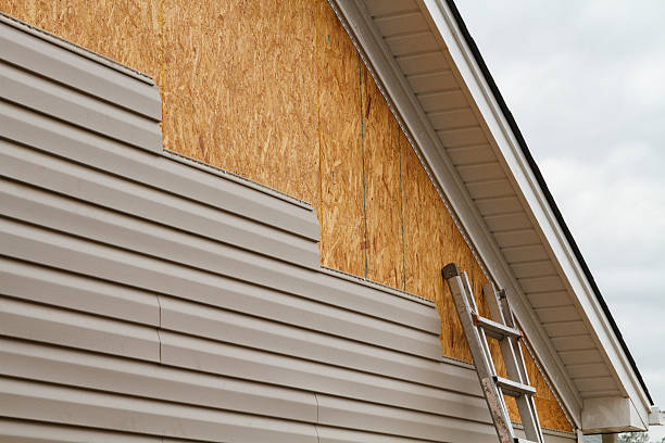 Professional Emergency Siding Repair technician working in Churchville, MD